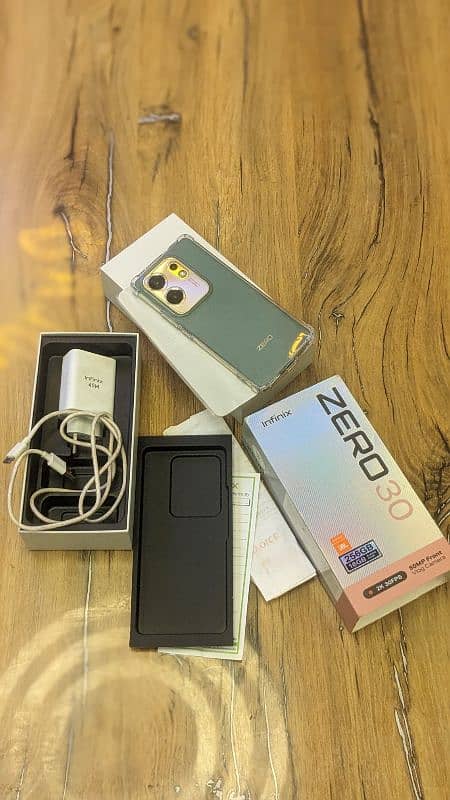 infinix zero 30  16GB 8 + 8 256 GB official PTA complete box 0