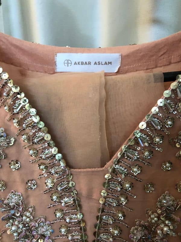 Formal ready to wear brand new long frock by Akbar Aslam 1