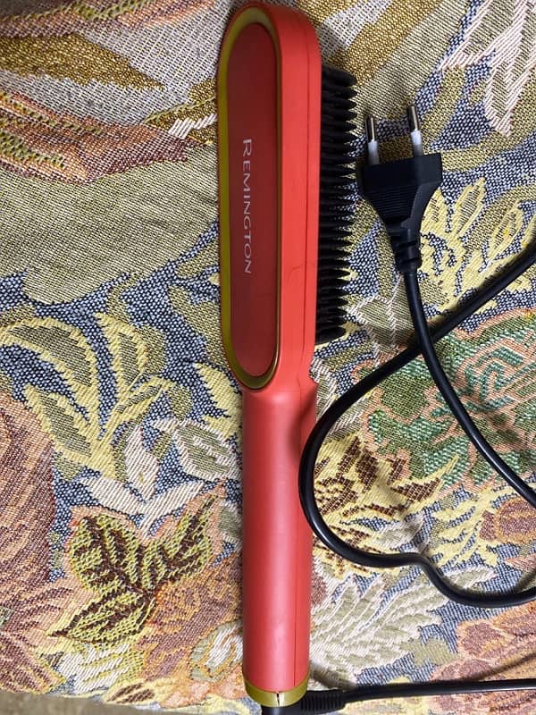 Remington hair straightener ,,it’s very easy and smooth ,, 1