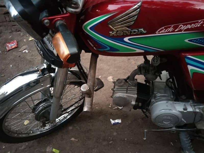 Honda 70cc totally original 2019 ka number hai 03020066870 0