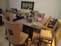 6 seater dining table. glass top