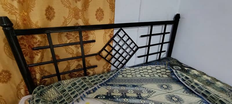 Iron bed with mattress 0