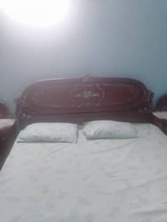 bed with side table and matress