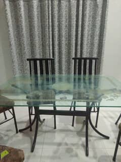 Glass dining table with 6 chairs