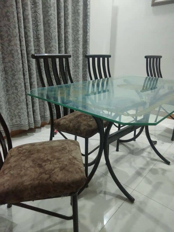 Glass dining table with 6 chairs 1