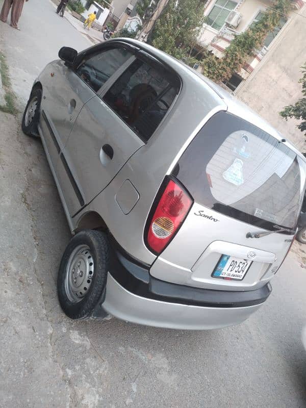 Hyundai Santro 2009 on my name . 3