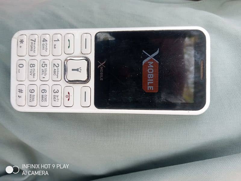 X mobile for sale in good condition 0