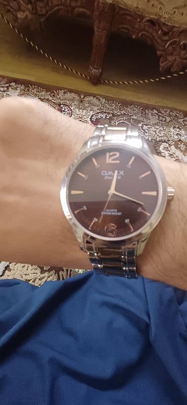 Omax Gold-Plated Analog Watch - Like New" 2