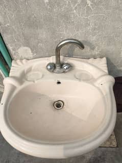 Used wash Basin with tab.