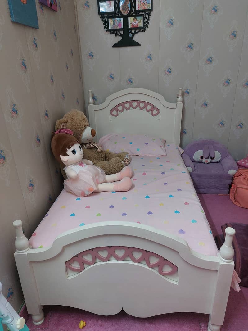 Wooden bed with wooden cupboard 0