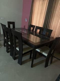 8 seater wooden and glass dining table set