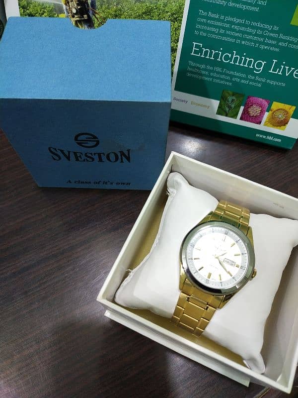 Sveston Watch Gold & White colour 1