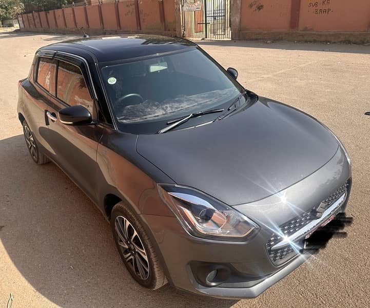 Suzuki Swift Glx cvt dual tone 2024 0