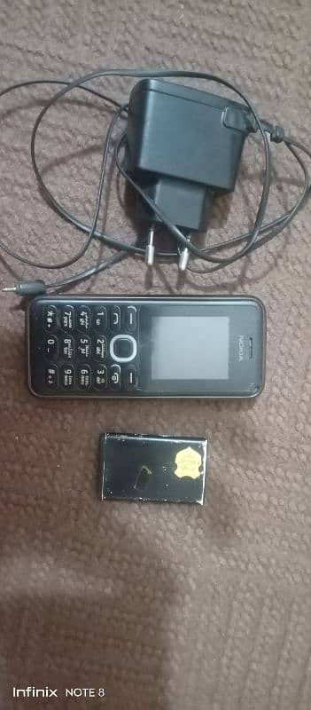 Nokia 108 with Original Charger 2