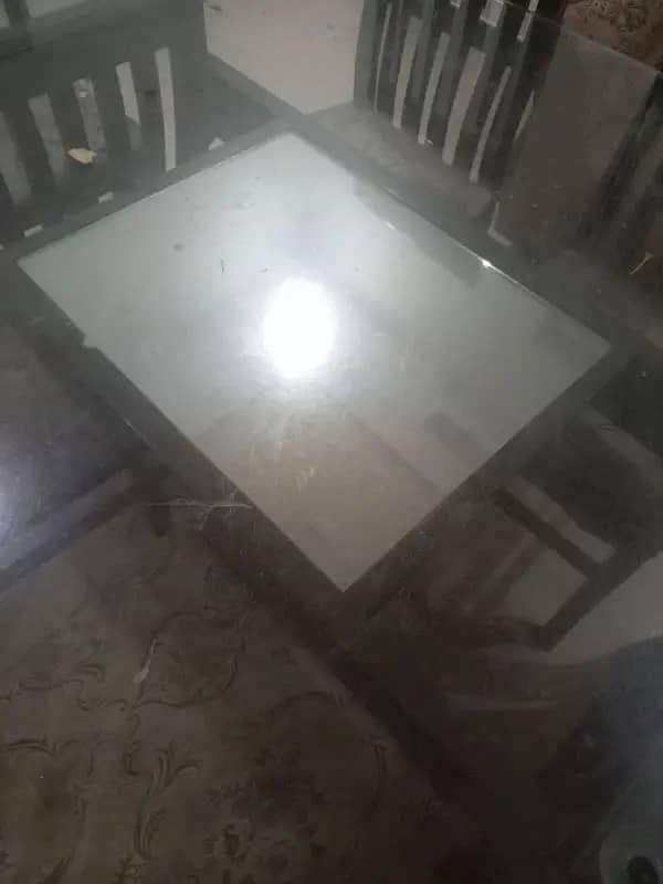 Dining Table for sale, Glass 12mm, wooden stand , chairs 1