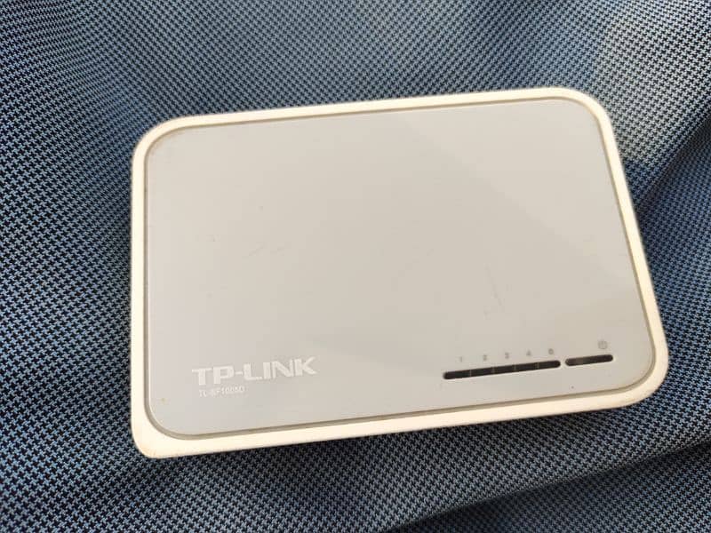 TP-LINK TL-SF1005D 0