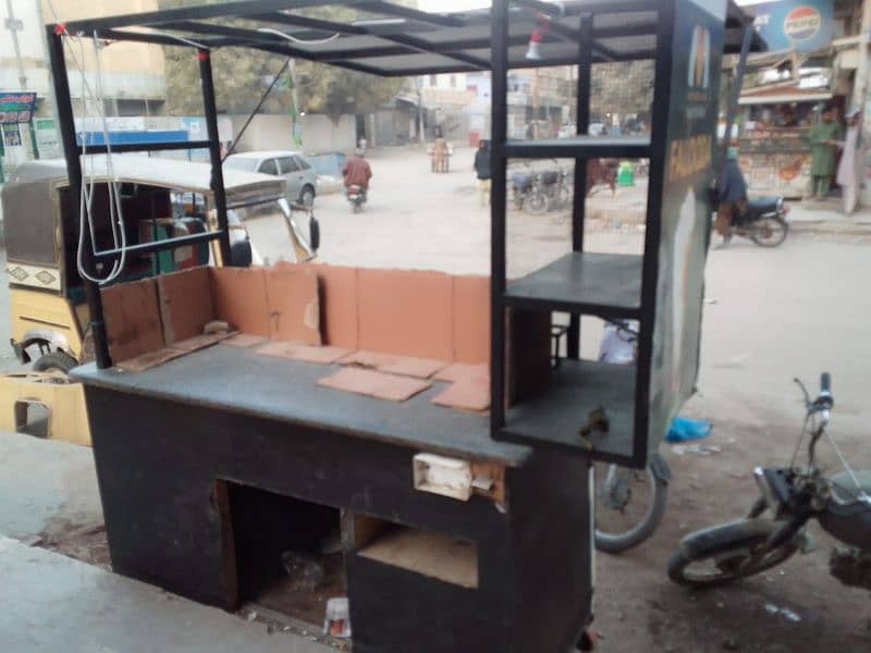 food stall, counter for chips, limca soup, french fries. 3