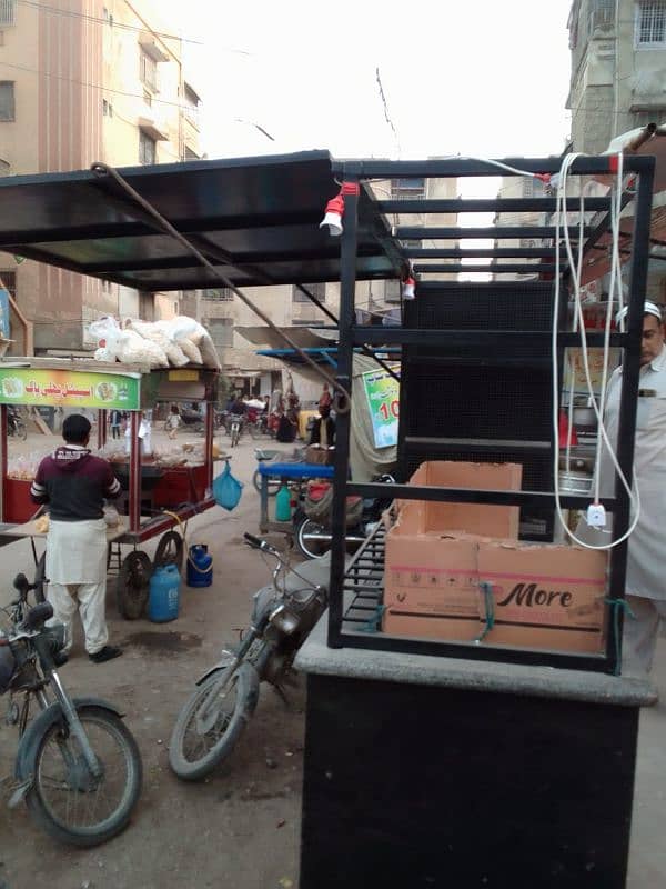 food stall, counter for chips, limca, soup, french fries. 3