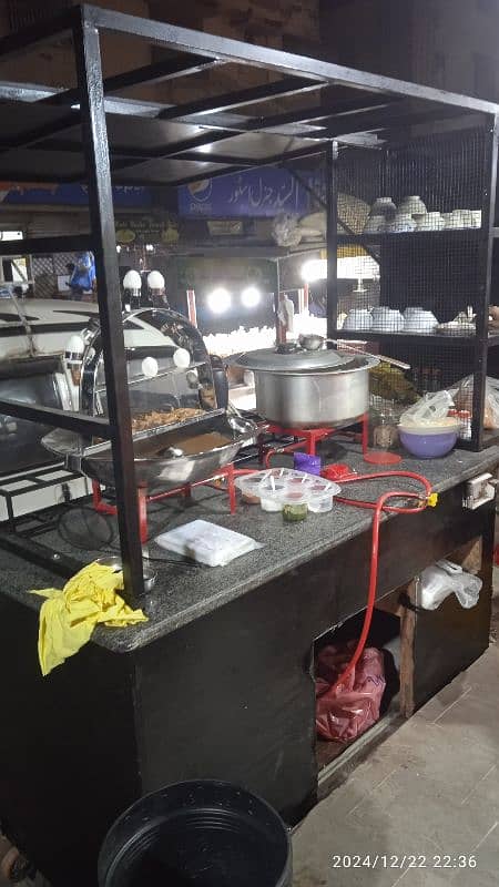 food stall, counter for chips, limca, soup, french fries. 5