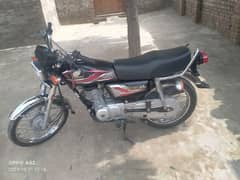 CD Honda 125 Motorcycle