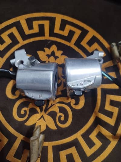 Honda 125 grips/assembly