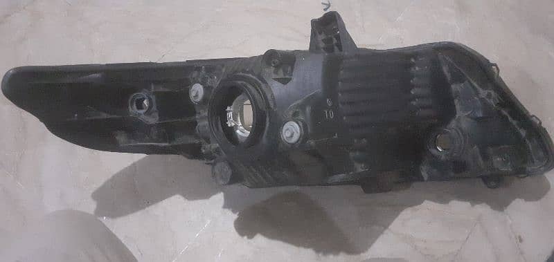 honda city 15 head light single piece ha use ma 1