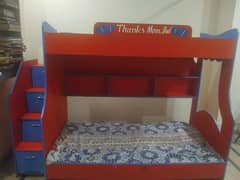 Double story bed with two mattress.