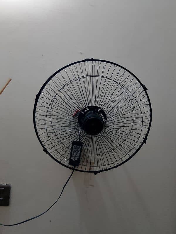 2 wall bracket fans with supplies 2