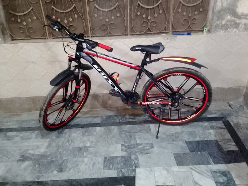 2 bicycles Roxy and SK Bikes for sale 0