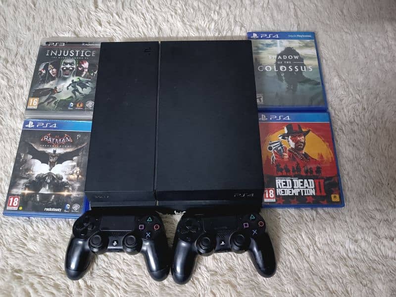 PS4 1 Terabyte. 2 original controllers. 5 games. 2