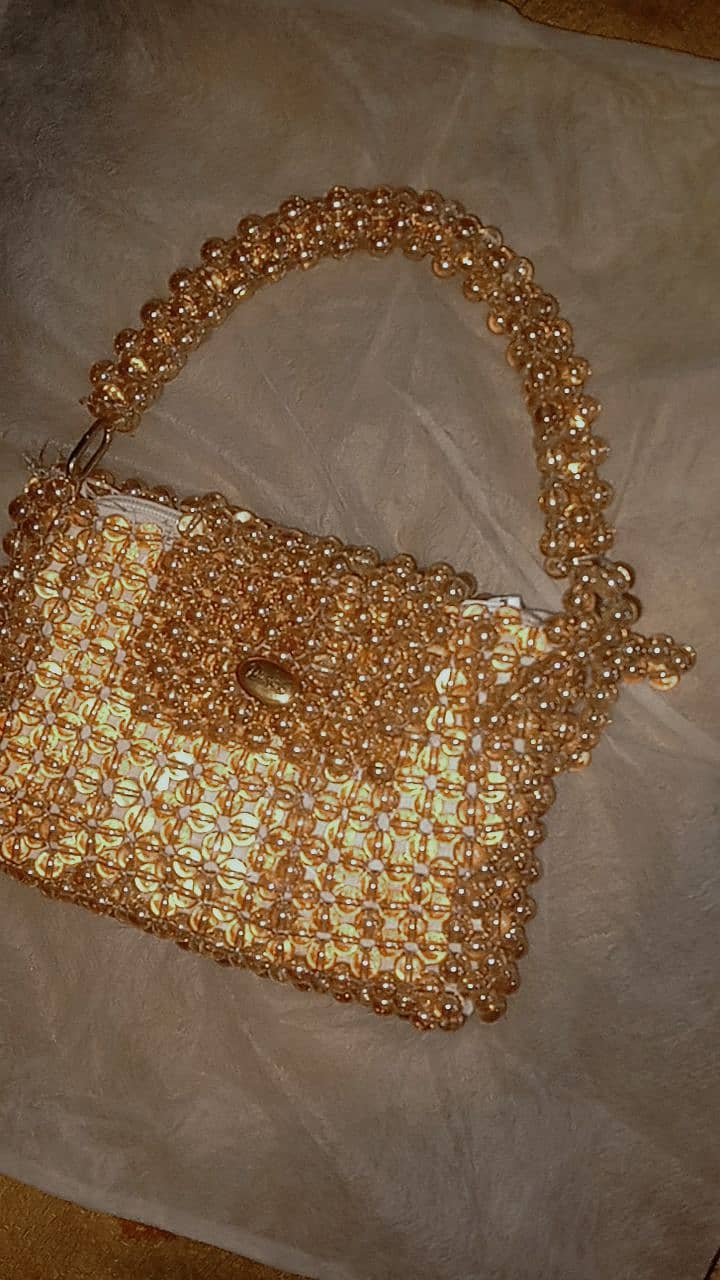 Golden beads handbag 0