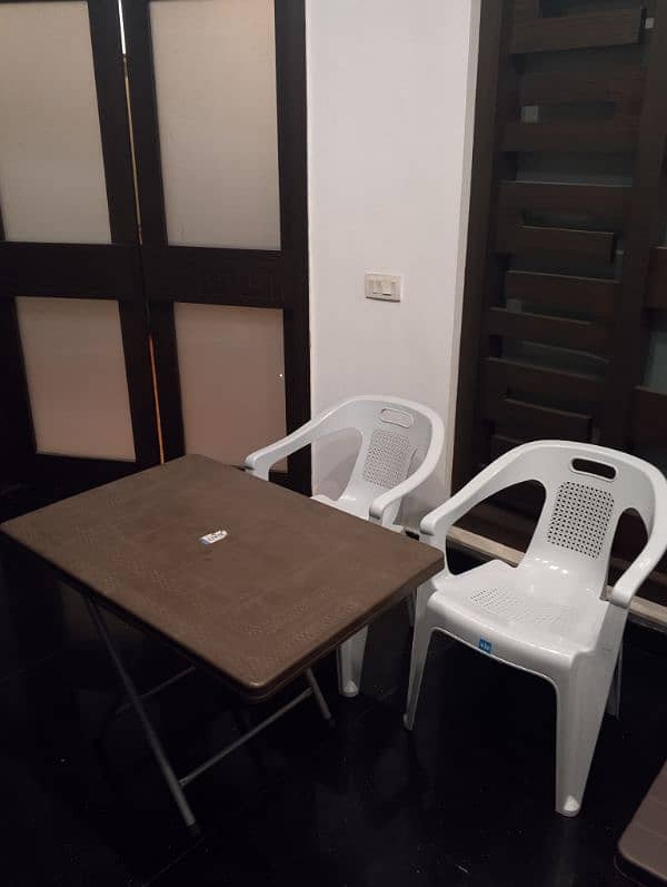 Plastic chairs and tables 2