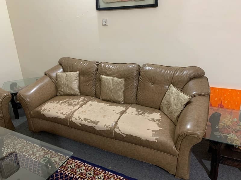 urgent sale two  7 seater sofas with tables 5