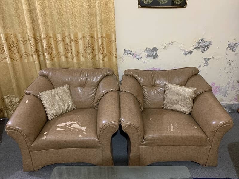 urgent sale two  7 seater sofas with tables 8