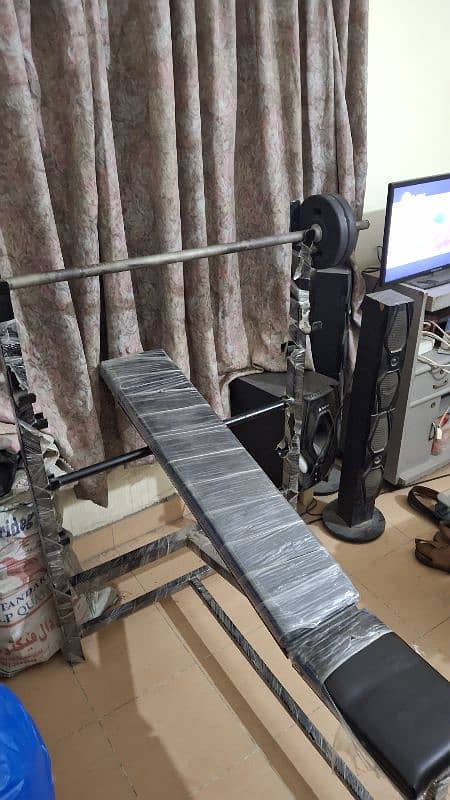 bench press & barbel rod 4 2kg plates for sale 0