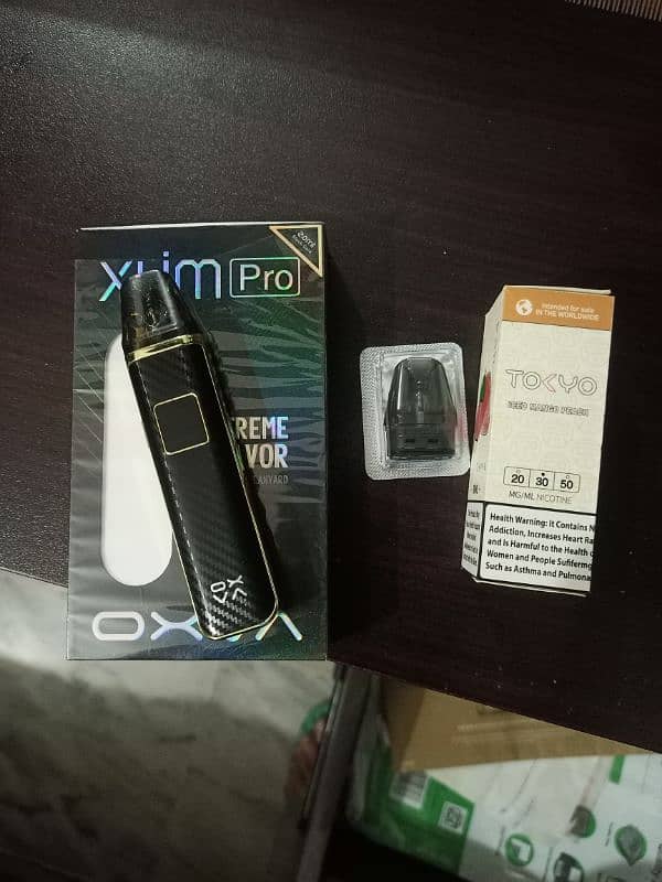 Oxva slim pro with extra coil 1