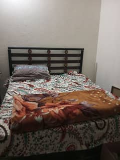 double bed with spring mattress