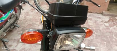 Honda 125 18 model with golden number 420