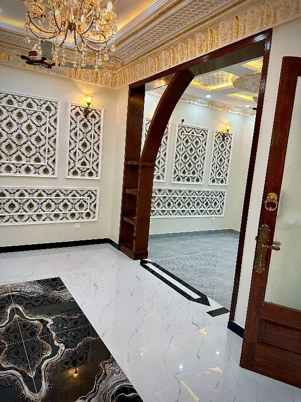 Central park A1 block 5 Marla Spanish house facing park available for sale prime location near tooo park and Masjid. . 12