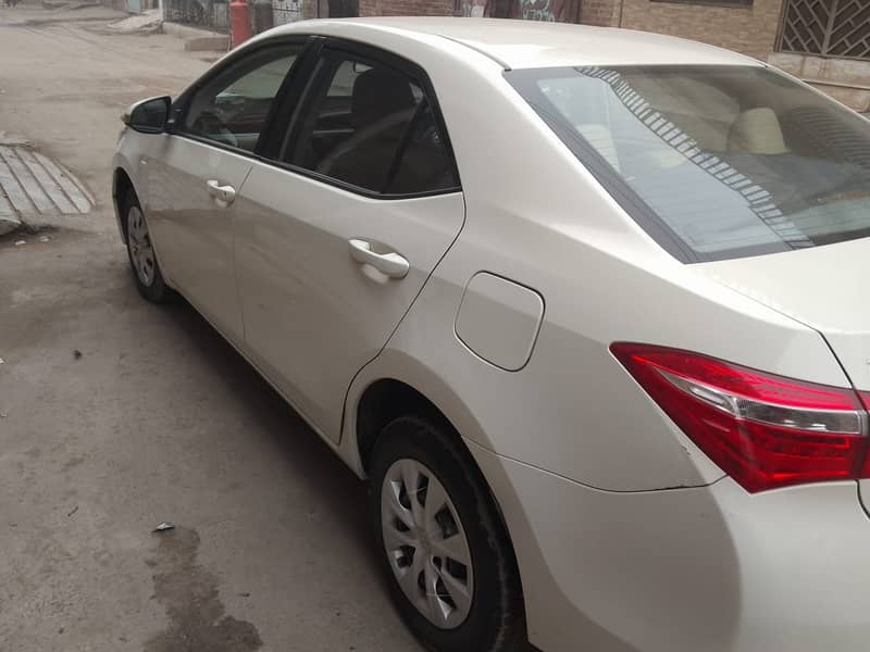 Toyota Corolla XLi model 2015 5