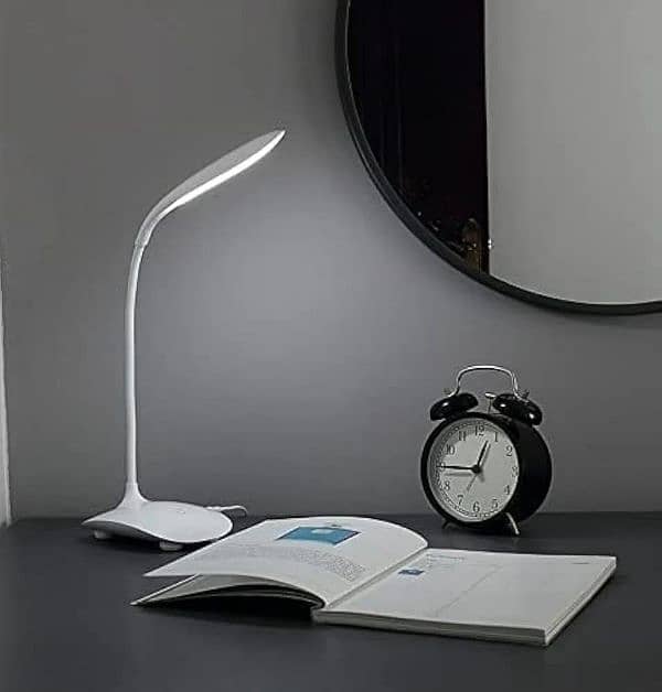 Adjustable multicolour Led table lamp-small and portable 0