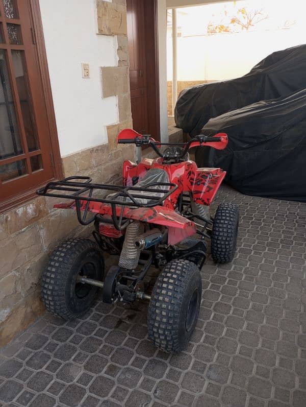 ATV quad bike four wheel off road on road 1