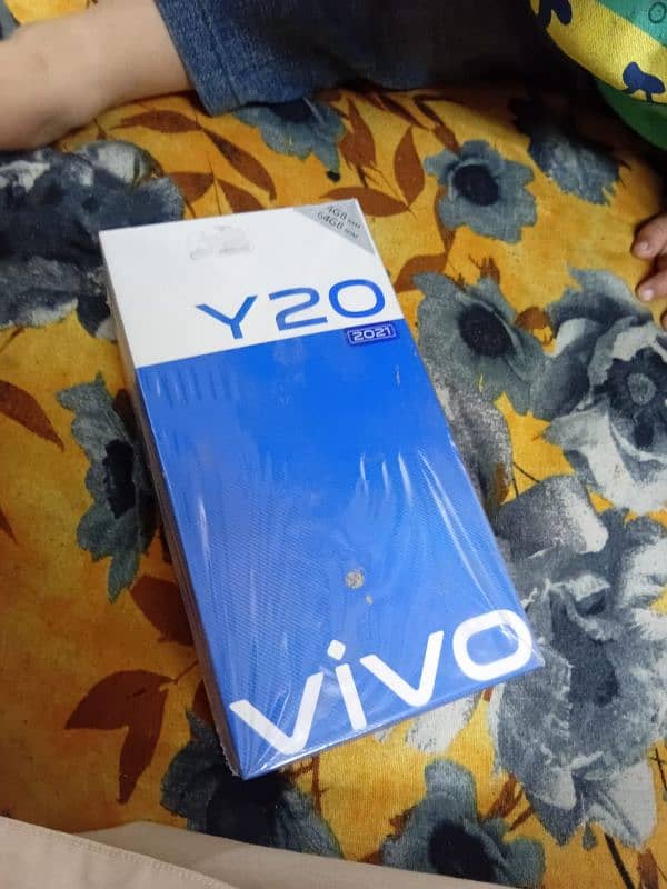 Vivo Y20 box charger available. 3