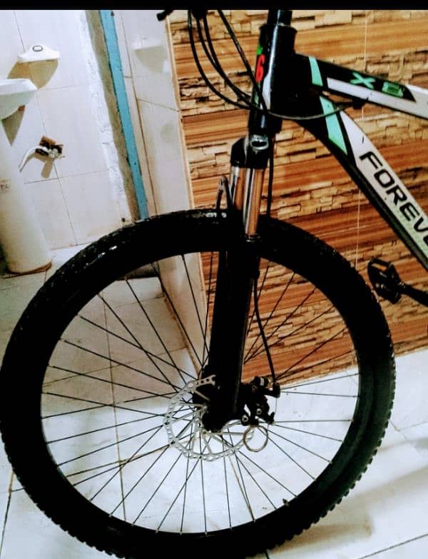 bicycle impoted full size 26 inch brand new 5 month used 2