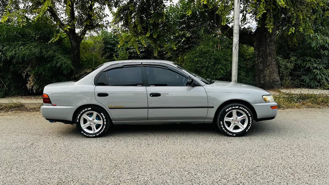 Toyota Corolla GL Pakistani Lahore number model 1994 reg 1995 total g 8