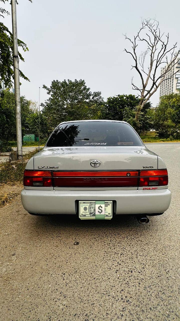 Toyota Corolla GL Pakistani Lahore number model 1994 reg 1995 total g 12