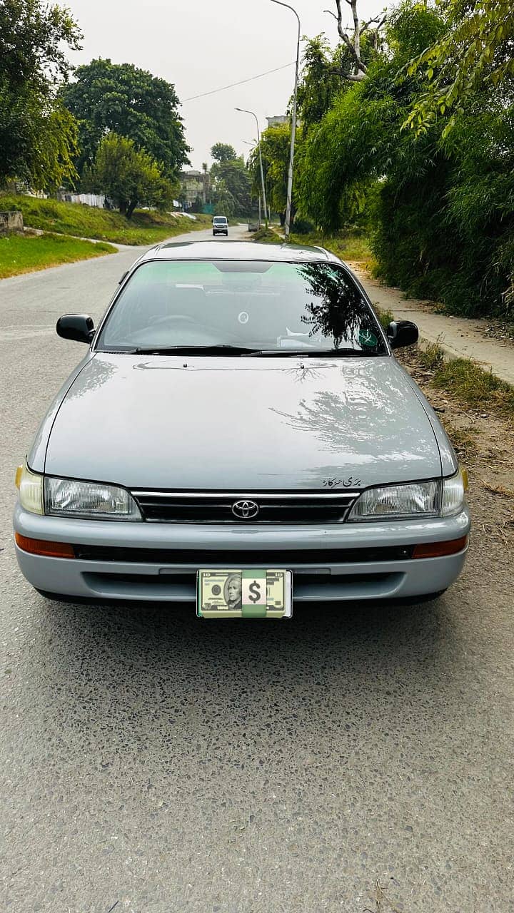 Toyota Corolla GL Pakistani Lahore number model 1994 reg 1995 total g 13