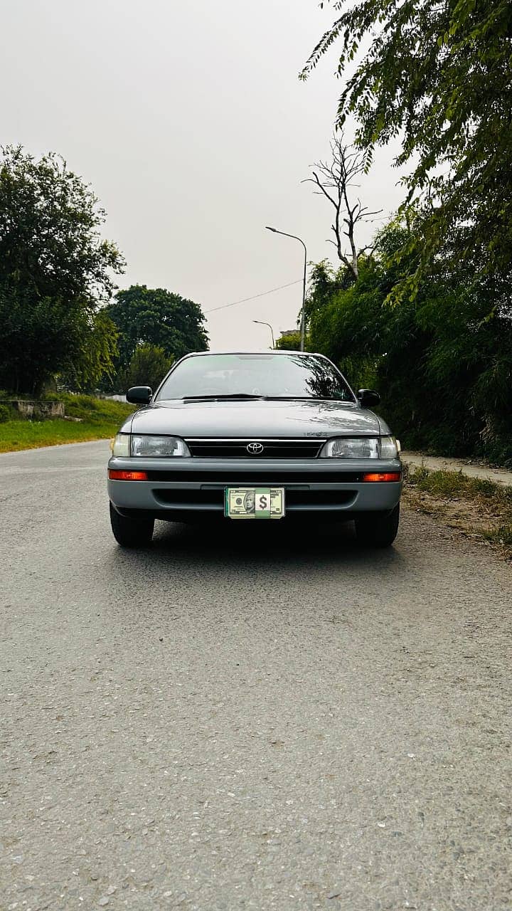 Toyota Corolla GL Pakistani Lahore number model 1994 reg 1995 total g 14