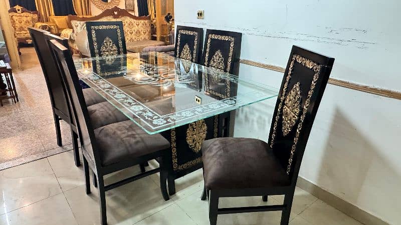 2 months used 8 chairs dining set 1