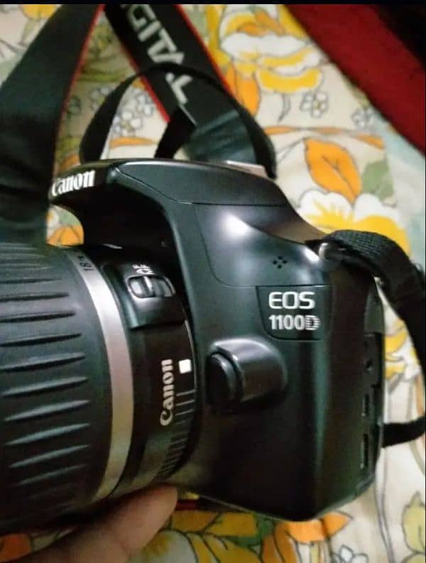 Canon 11000D 18.55 LANs 10.10 candisan one hands USD 2